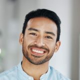 happy-smile-and-portrait-of-man-in-office-for-exe-2023-11-27-05-34-23-utc